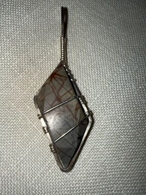 Artist made sterling wire wrapped Picasso Stone in Sterling. Necklace pendant